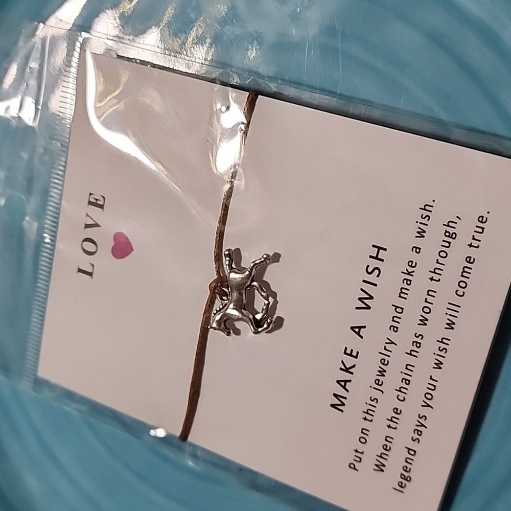 SILVER HORSE WITH BROWN BRACELET